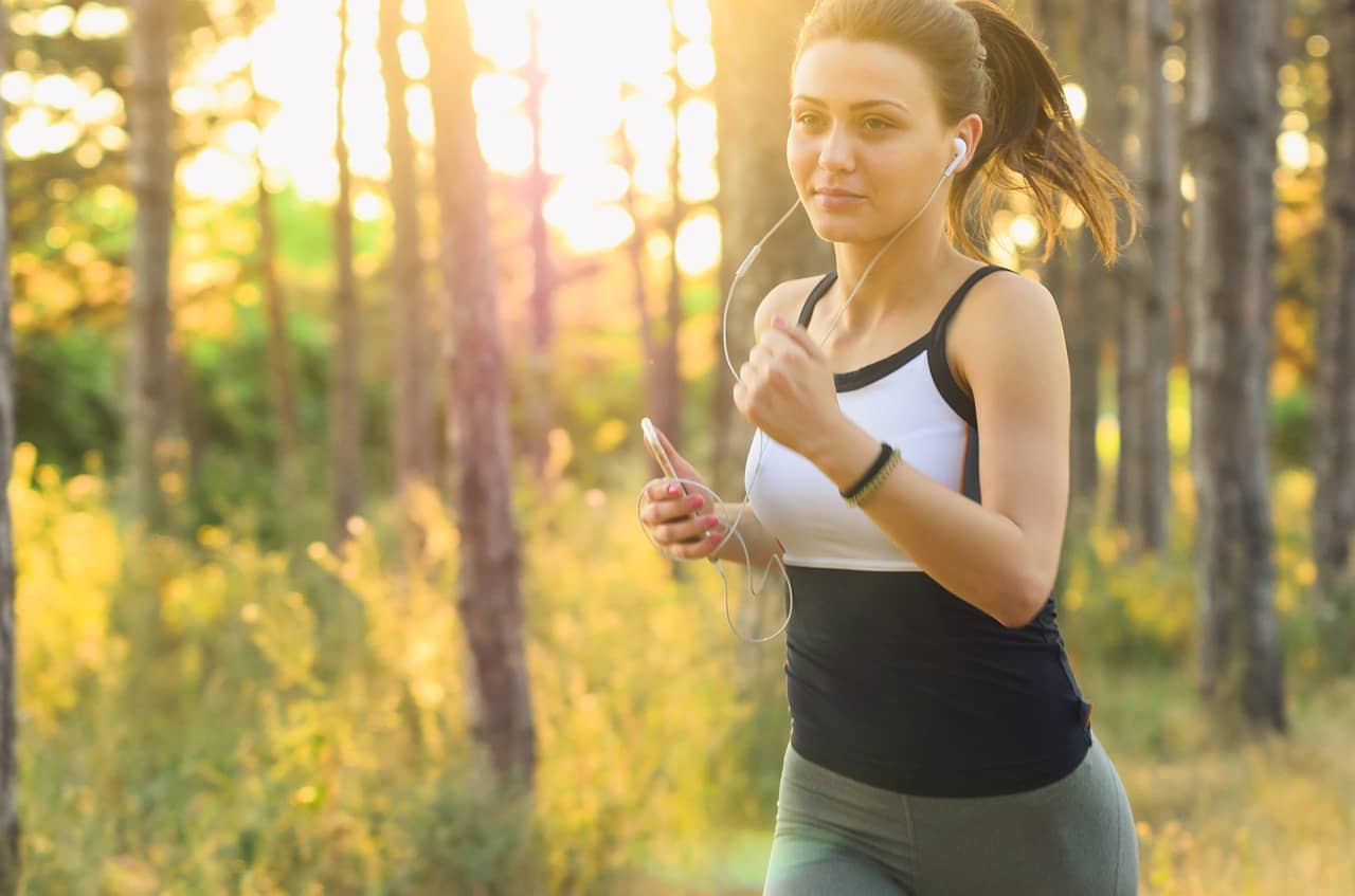 lady listening to music while jogging