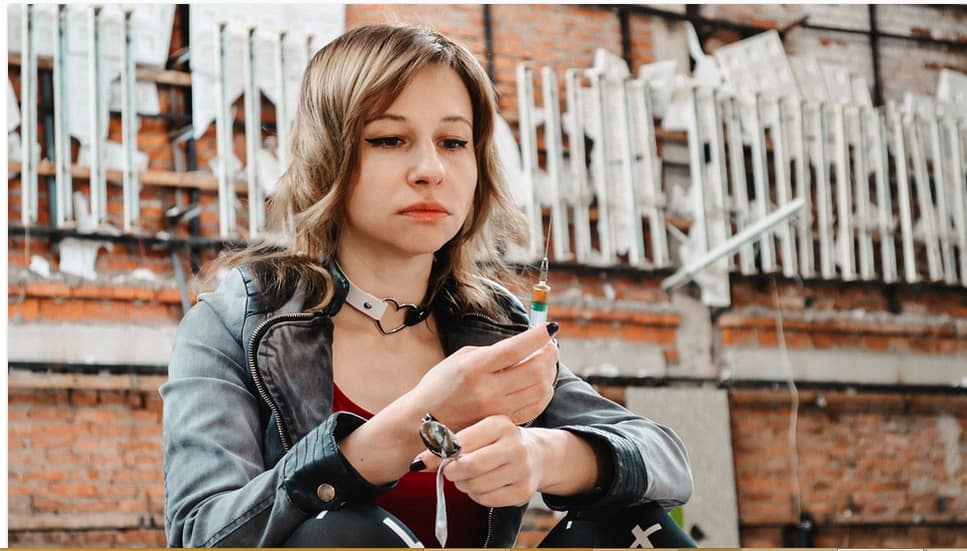 a person abusing drugs