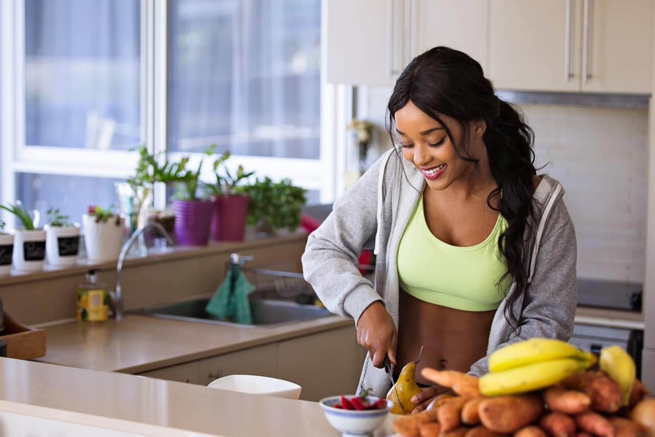 a woman cooking meals